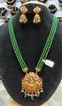Gold Plated Laxmi Pendant with green crystals