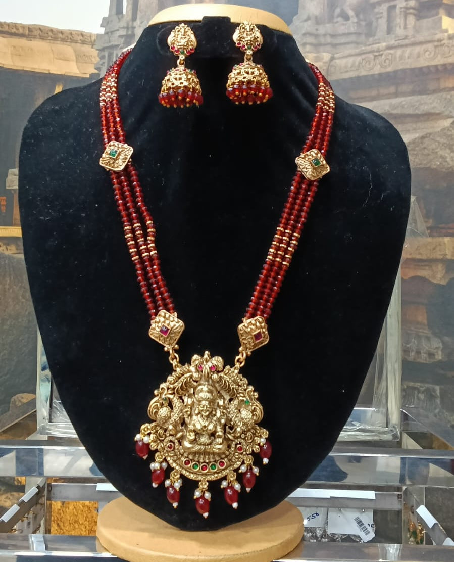 Gold Plated premium Necklace Set with Maroon Crystal Maala