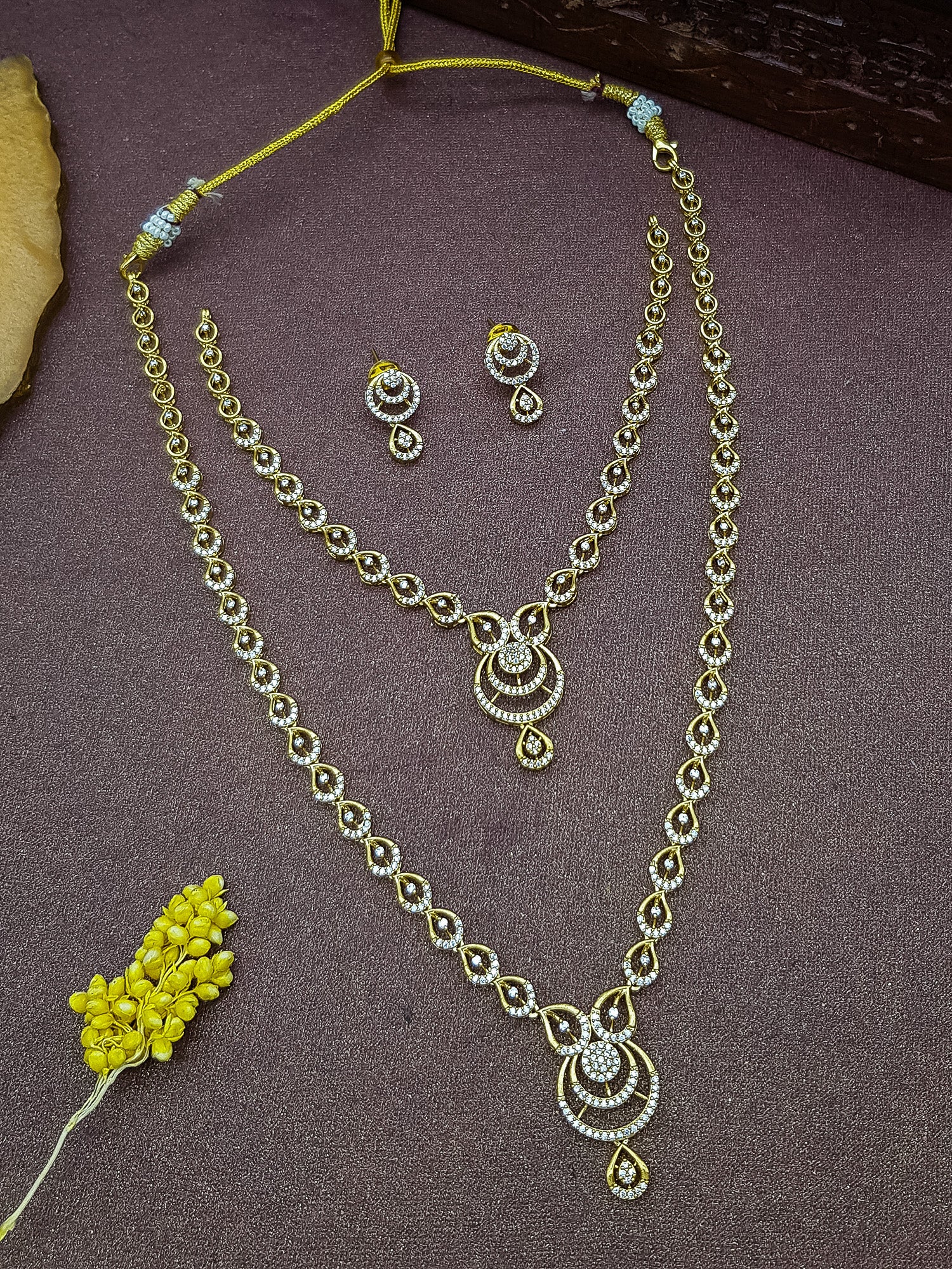 Drop design necklace in white cz zercon stones