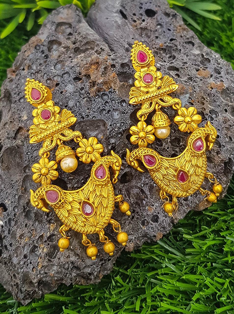 Gold plated Temple design Jhumka Earrings