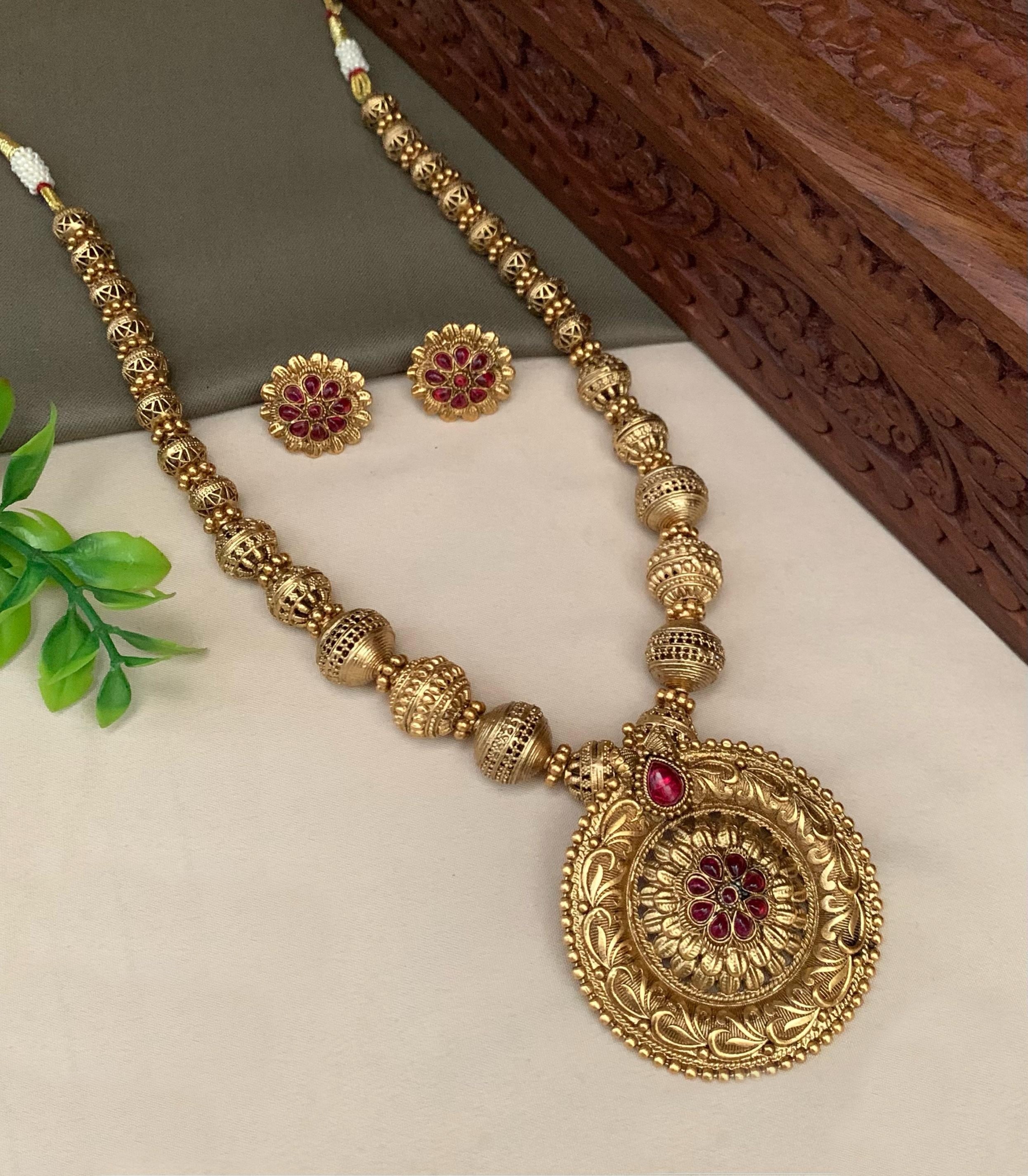 Premium Gold Finish Exclusive Pendent Set with Gundu and CZ Stones 23418N