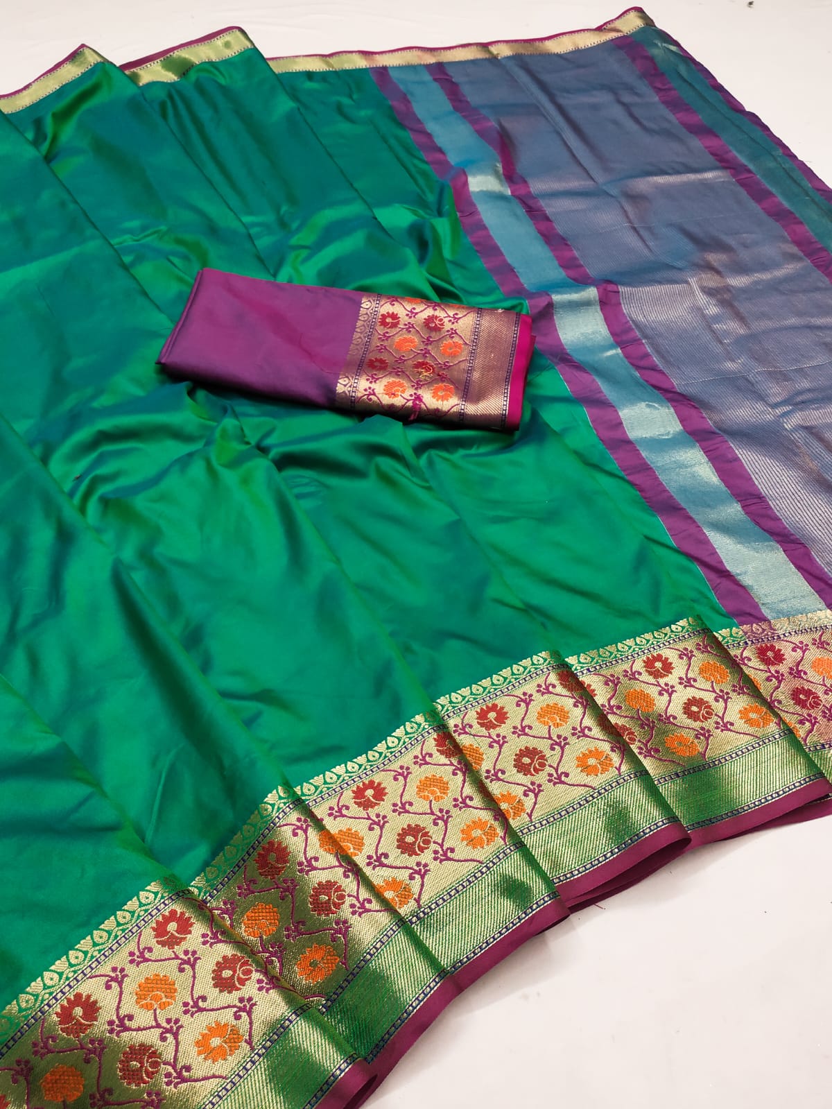 This beautifully Mysore Semi- Silk saree with broad contrast border 23508N