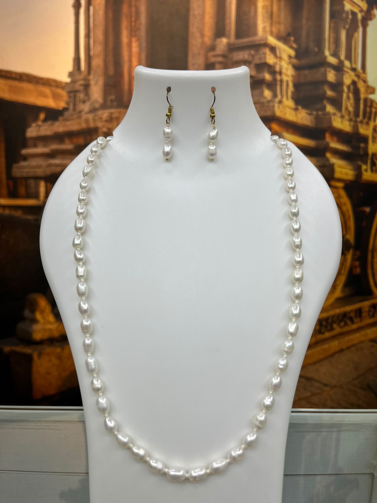 Single Line Certified Fresh Water Pearl maala with earrings