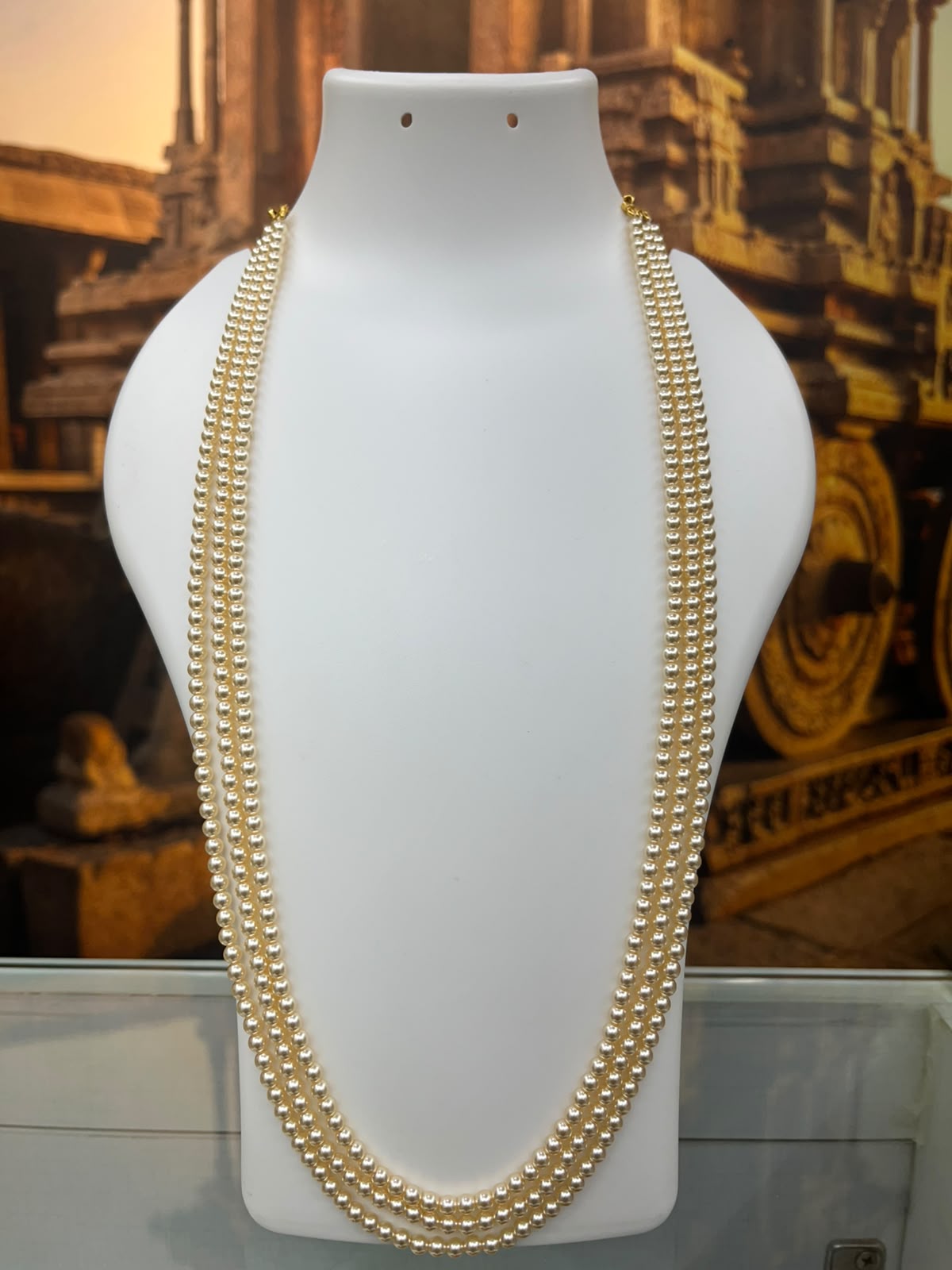 22 inches 4 line 4mm Swarovski Pearl maala with 2 sides gandabaranda mopu
