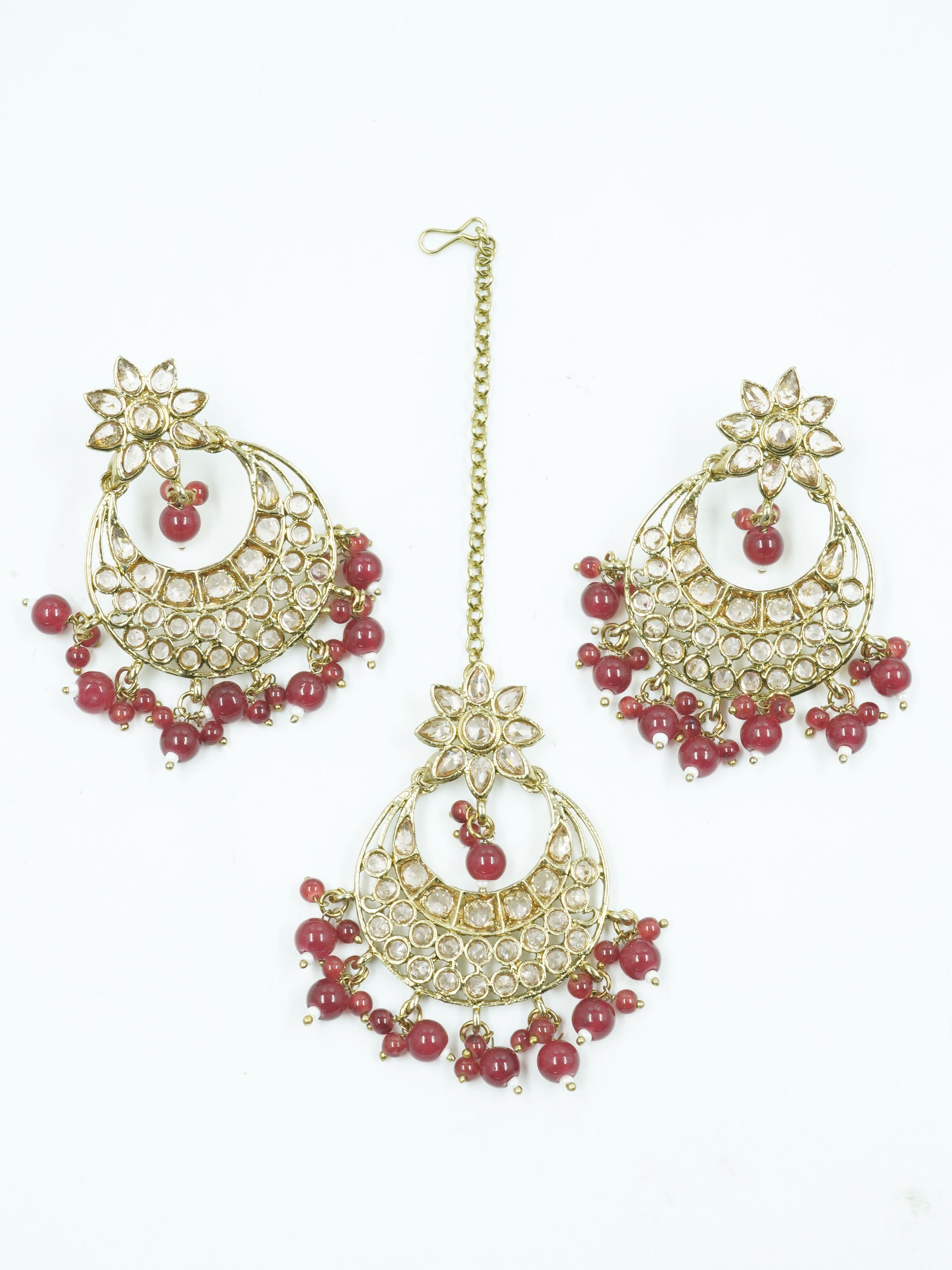 Faint gold finish Earring/jhumka/Dangler with Mang Tikka with Brownish Red Color Stones 11752N