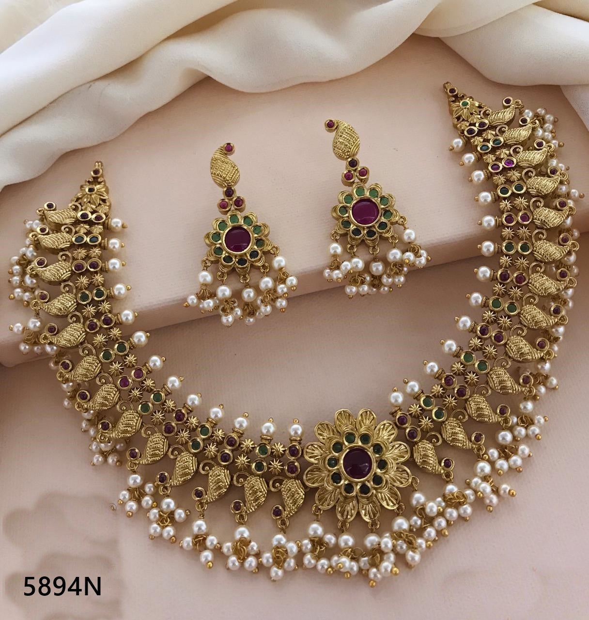 Premium Gold Finish High Quality Short Necklace Set with AD stones for all occasions 5894N