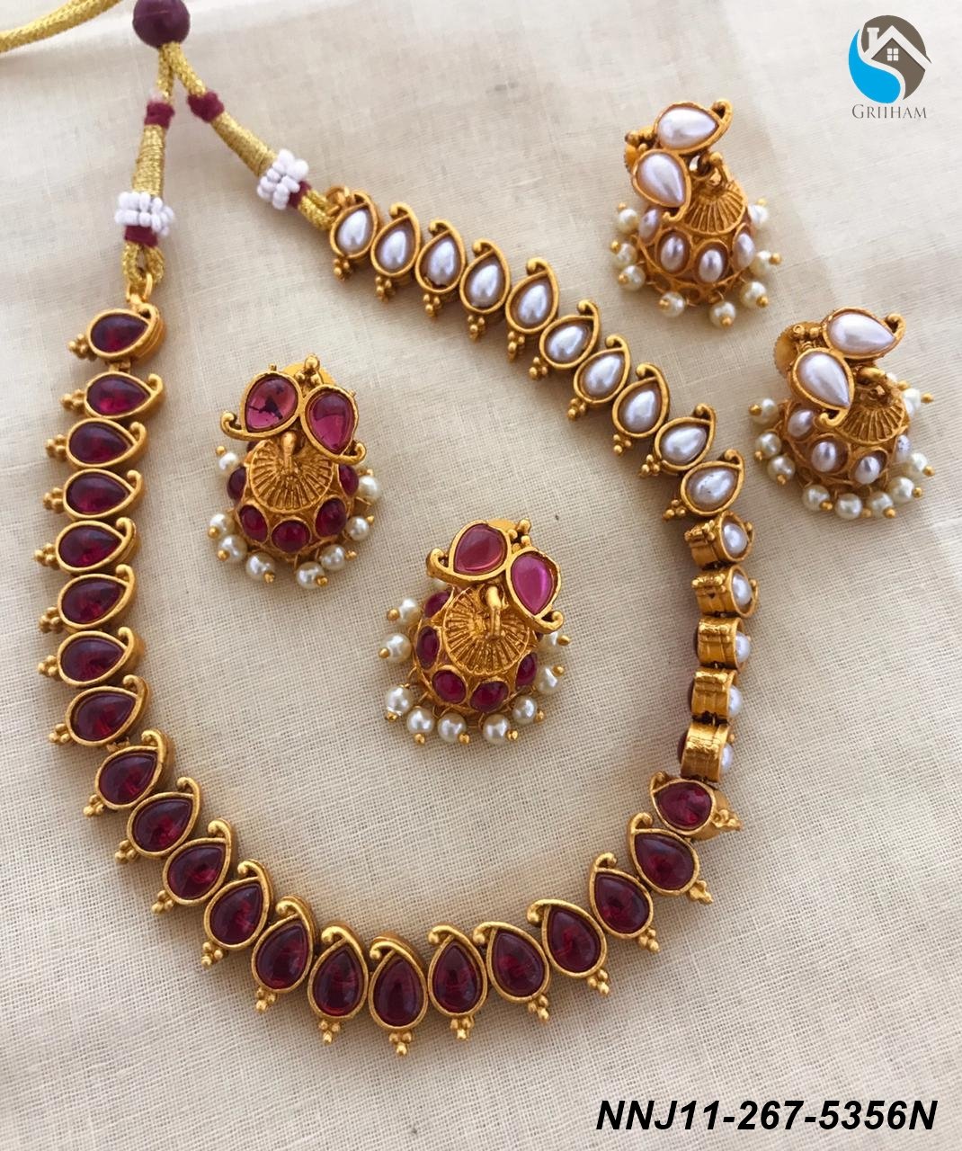 Premium Gold Finish Reversible Necklace Set with Red and White colour stones with two pairs of erring 5356N
